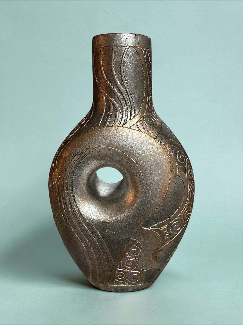 decorative Ceramic Vessel dark metallic bronze 16” x 10” in preowned condition.